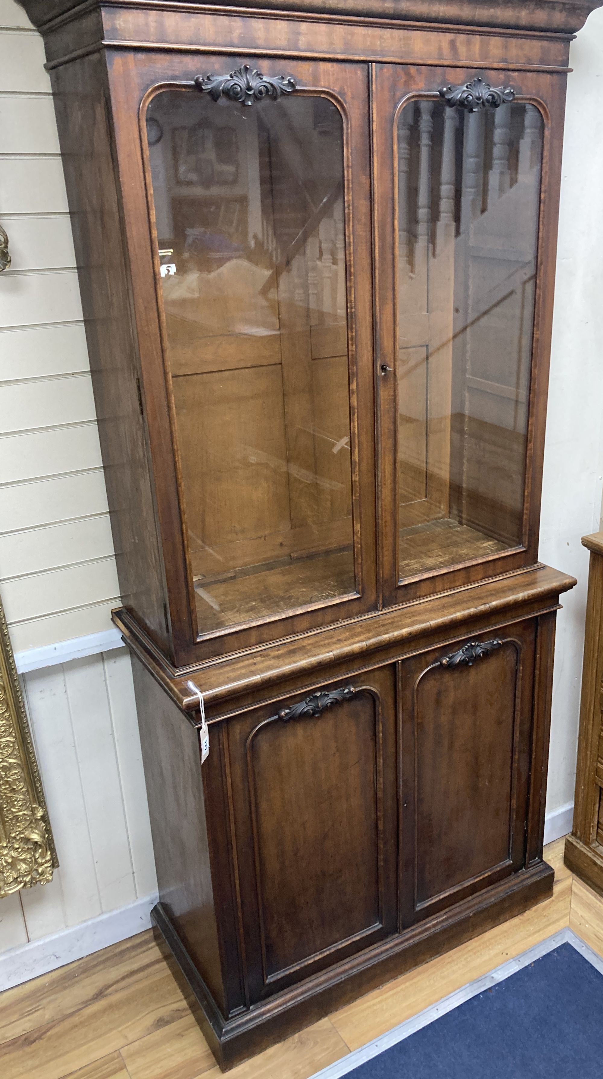 A Victorian mahogany bookcase / cupboard, width 97cm, depth 46cm, height 214cm